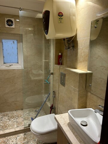 Bathroom in 1 RK Apartment at DLF One Midtown, Moti Nagar – for Rent
