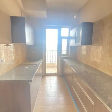 Kitchen in 3 BHK Apartment at Eldeco Accolade, Saini Colony – for Rent