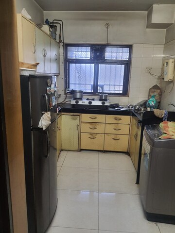 Kitchen in 2 BHK Apartment at Kopar Khairane – for Sale