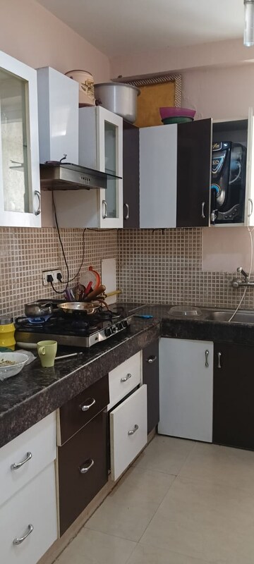 Kitchen in 2.5 BHK Apartment at Great Value Sharanam, Sector 107 – for Sale
