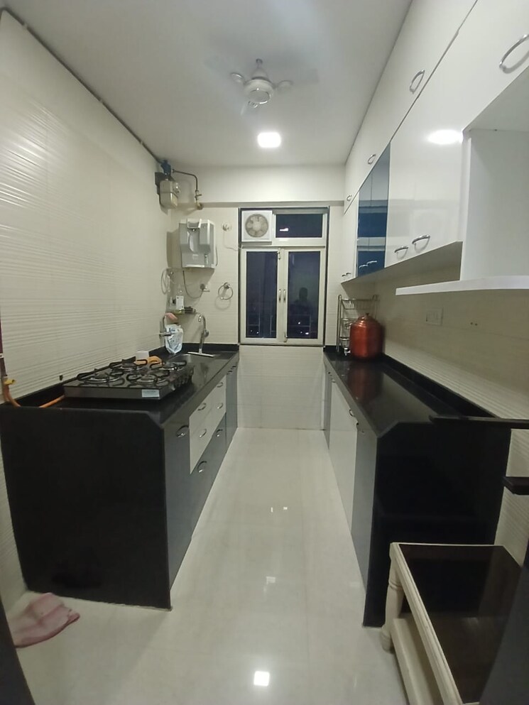 Kitchen, cosmos-classique 2 Bedroom 670 Sq.Ft. Apartment In Ghodbunder Road Thane 7965960