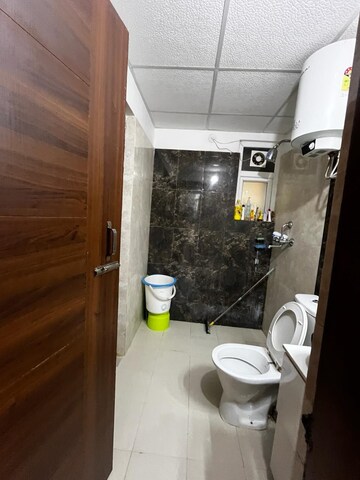 Bathroom in 3 BHK Apartment at Charms Castle, Raj Nagar Extension – for Sale