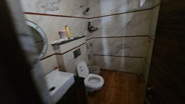 Bathroom in 3 BHK Apartment at Ansal Housing Woodbury, Patiala Road – for Rent