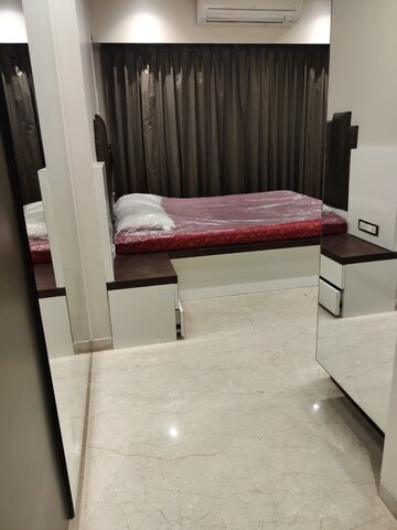 Bedroom in 2 BHK Apartment at Raunak Viraj Bliss, Khar West – for Sale