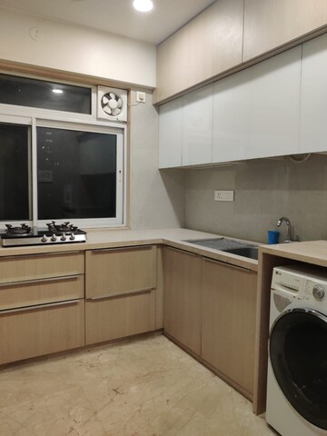 Kitchen in 2 BHK Apartment at Raunak Viraj Bliss, Khar West – for Sale