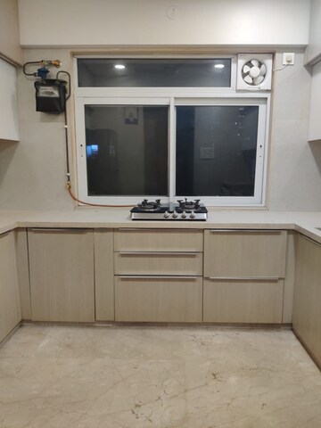 Kitchen in 2 BHK Apartment at Raunak Viraj Bliss, Khar West – for Sale