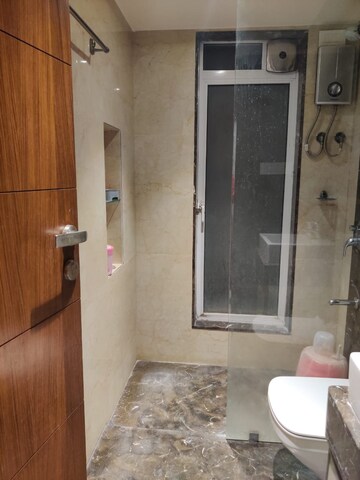 Bathroom in 2 BHK Apartment at Raunak Viraj Bliss, Khar West – for Sale