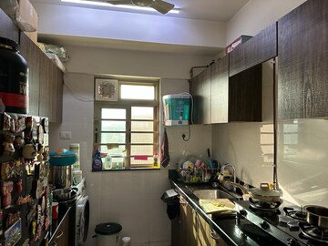 Kitchen in 2 BHK Apartment at Sheth Vasant Oasis, Andheri East – for Rent