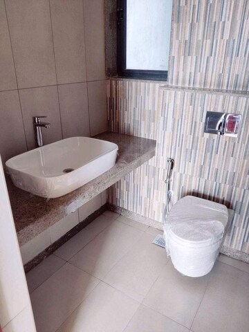 Bathroom in 2 BHK Apartment at Shapoorji Pallonji Vicinia, Powai – for Rent