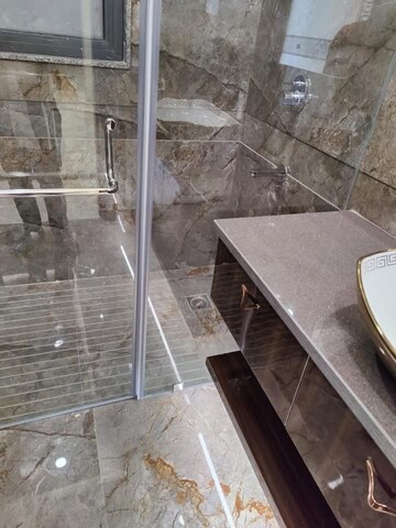 Bathroom in 4 BHK Apartment at Ansal API Esencia, Sector 67 – for Sale
