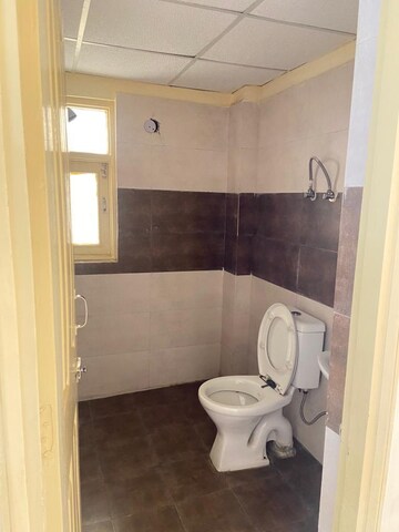 Bathroom in 2 BHK Apartment at SVP Gulmohur Garden, Raj Nagar Extension – for Sale