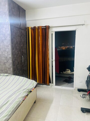 Bedroom in 2 BHK Apartment at Signature Global Orchard Avenue, Sector 93 – for Rent