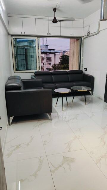 Living Room in 1 BHK Apartment at Lokpuram CHS, Vasant Vihar – for Rent