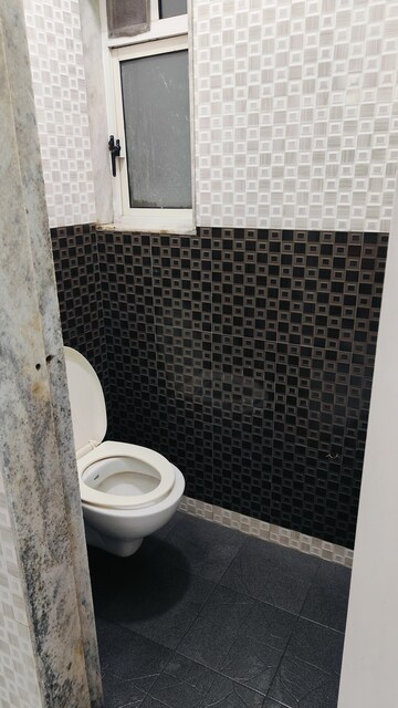 Bathroom in 1 BHK Apartment at Lokpuram CHS, Vasant Vihar – for Rent