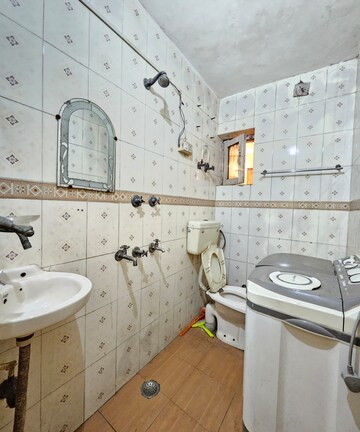Bathroom in 3 BHK Builder Floor at Maya Homes, Indrapuram – for Rent