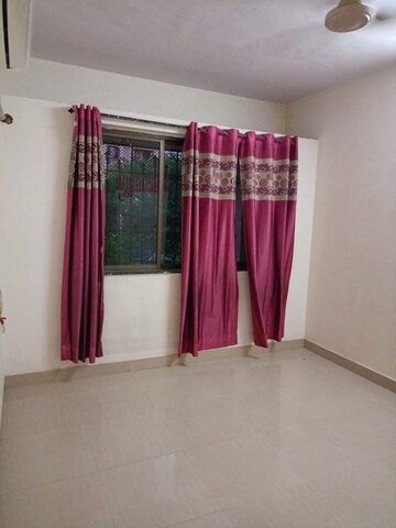 Living Room in 2 BHK Apartment at Shubharambh Complex, Manpada – for Rent