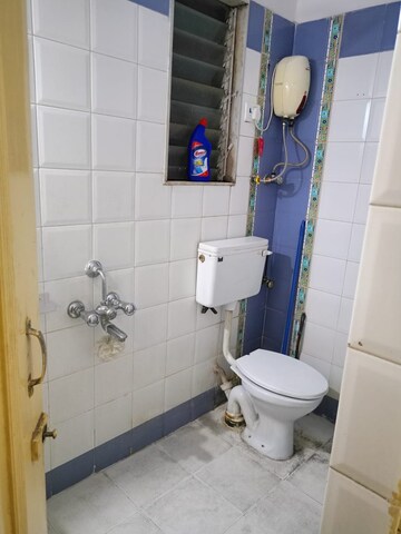 Bathroom in 2 BHK Apartment at Shubharambh Complex, Manpada – for Rent
