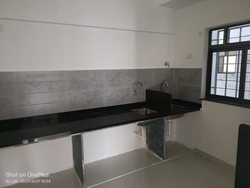 Kitchen in 2 BHK Apartment at Roshan Milestone, Tathawade – for Sale