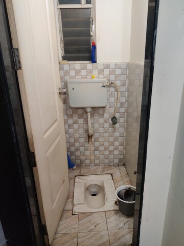 Bathroom in 1 BHK Apartment at Wadgaon Sheri – for Rent