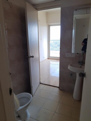 Bathroom in 3 BHK Apartment at Gaur Atulyam, Omicron I Greater Noida – for Rent