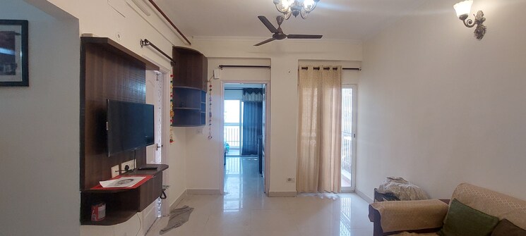 Living Room, maxblis-grand-wellington 1 Bedroom 615 Sq.Ft. Apartment In Sector 75 Noida 7966580