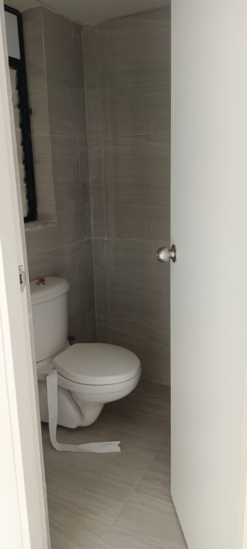 Bathroom in 1.5 BHK Apartment at Runwal Gardens Phase I, Dombivli East – for Rent