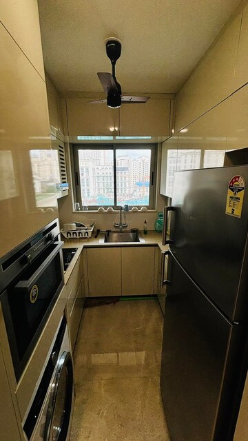Kitchen in 1 BHK Apartment at Hiranandani Regent Hill, Powai – for Rent