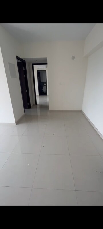Living Room in 1 BHK Apartment at Lodha Casa Maxima, Mira Road – for Sale