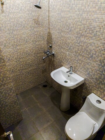 Bathroom in 2 BHK Apartment at Monarch Apartments Zirakpur, Vip Road – for Rent