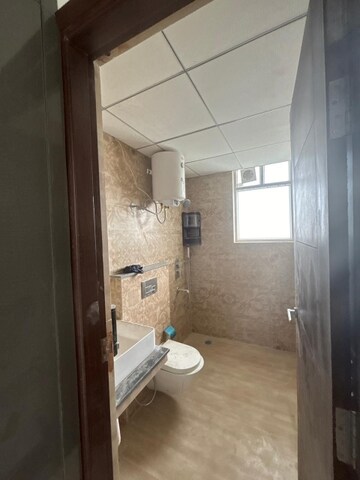 Bathroom in 3 BHK Apartment at Artique Uptown Skylla, International Airport Road – for Rent