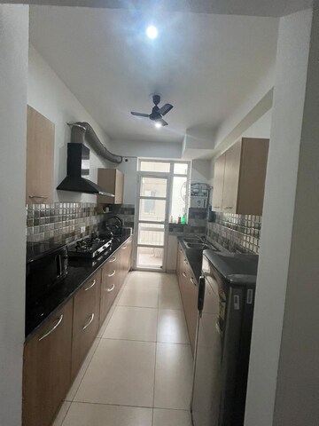Kitchen in 3 BHK Apartment at Sushma Joynest ZRK, Ghazipur – for Rent