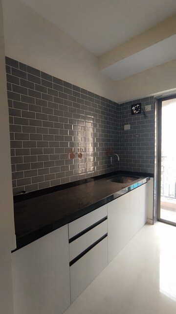 Kitchen in 1 BHK Apartment at Raunak City Sector 4, Kalyan West – for Rent