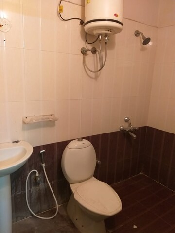 Bathroom in 2 BHK Apartment at Sai Krupa Harmony, Mahadevpura – for Rent