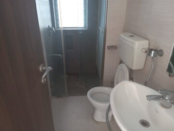 Bathroom in 3 BHK Apartment at Lokhandwala Whispering Palms XXclusives, Kandivali East – for Rent