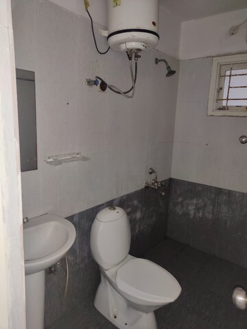 Bathroom in 3 BHK Apartment at Sai Krupa Harmony, Mahadevpura – for Rent