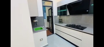 Kitchen in 3.5 BHK Apartment at Charms Castle Phase II, Raj Nagar Extension – for Sale