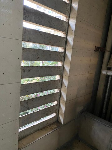 Staircase in 1 BHK Apartment at Lalani Residency, Kavesar – for Rent