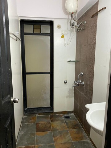 Bathroom in 1 BHK Apartment at Lalani Residency, Kavesar – for Rent
