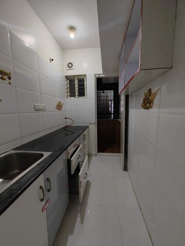 Kitchen in 1 BHK Apartment at Malhar CHS Vasant Nagari, Vasant Nagari – for Sale