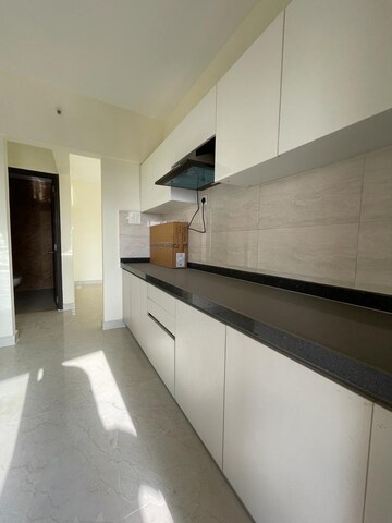 Kitchen in 1.5 BHK Apartment at MJ Shah Centrio, Govandi – for Rent