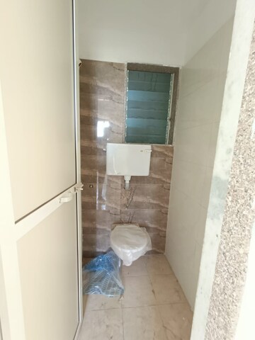 Bathroom in 1 BHK Apartment at Rutu Riverview Classic, Kalyan West – for Rent