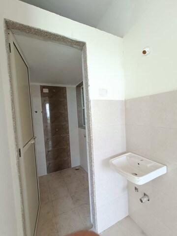 Bathroom in 1 BHK Apartment at Rutu Riverview Classic, Kalyan West – for Rent