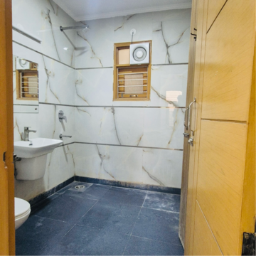 Bathroom in 1 BHK Builder Floor at Palm Residency Chhatarpur, Rajpur Khurd Extension – for Rent
