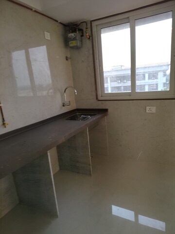 Kitchen in 1 BHK Apartment at Acharat Baug, Santacruz West – for Sale