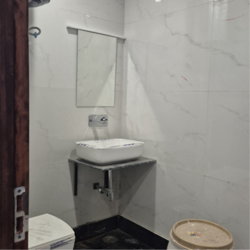 Bathroom in 2 BHK Builder Floor at Palm Residency Chhatarpur, Rajpur Khurd Extension – for Rent