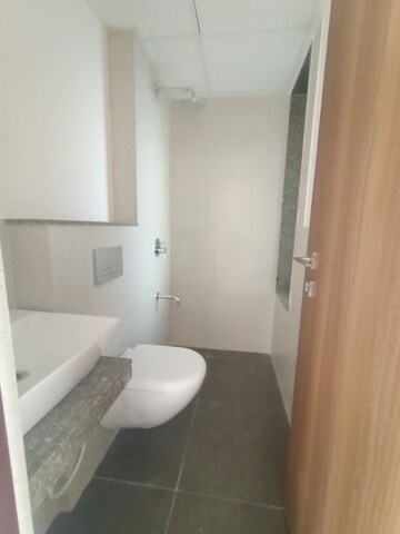 Bathroom in 2 BHK Apartment at Piramal Vaikunth, Balkum Pada – for Rent