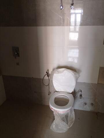 Bathroom in 2 BHK Apartment at Cosmos Express 99, Sector 99 – for Sale