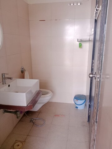 Bathroom in 1 BHK Apartment at Raunak Delight, Owale – for Rent