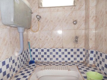 Bathroom in 1 BHK Apartment at Sai Baba Complex, Aarey Colony – for Rent