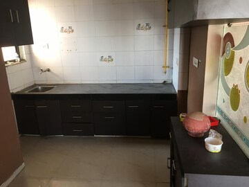 Kitchen in 2 BHK Apartment at Sahaj Solarium, Vasna – for Rent